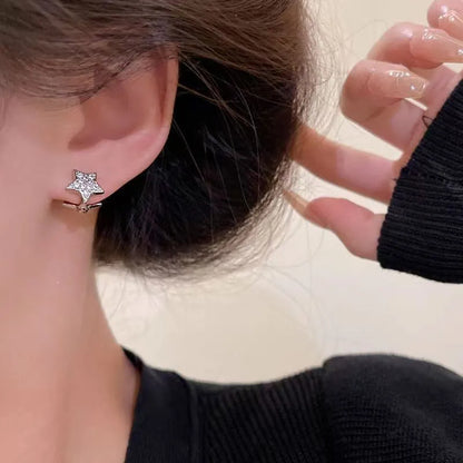 White star zircon earrings for women with copper base and electroplated finish, geometric shape, one pair