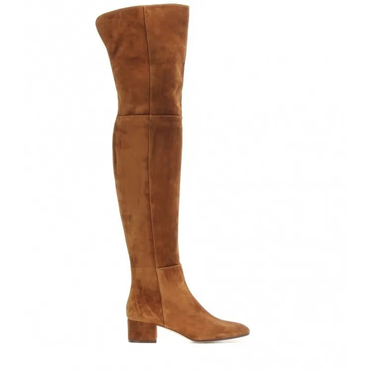 Women's grey suede over-the-knee flat boots with pointed toe and thick rubber sole on a neutral background