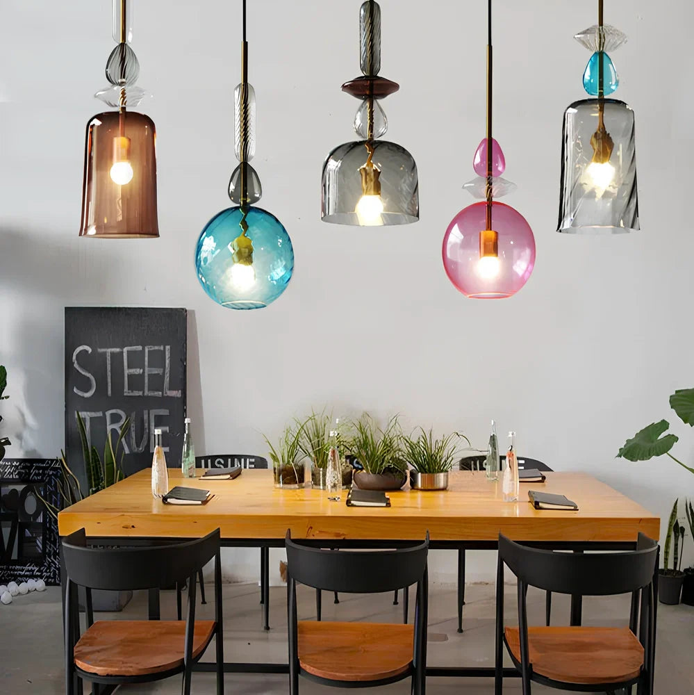 Glass chandelier with adjustable height above bar counter showing macaron-inspired candy glass design