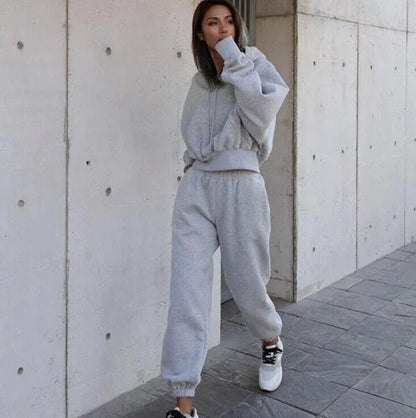 Women's casual hoodie outfit in various colors and sizes, featuring a stylish design and comfortable polyester construction.