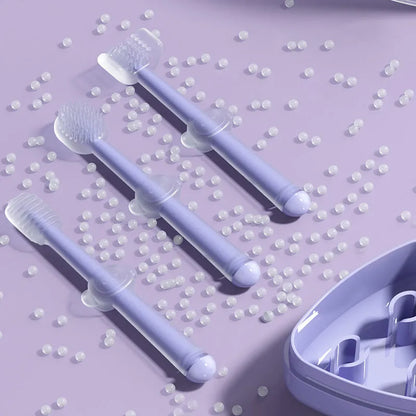 Silicone pet toothbrush with long handle in blue, green, and purple colour options