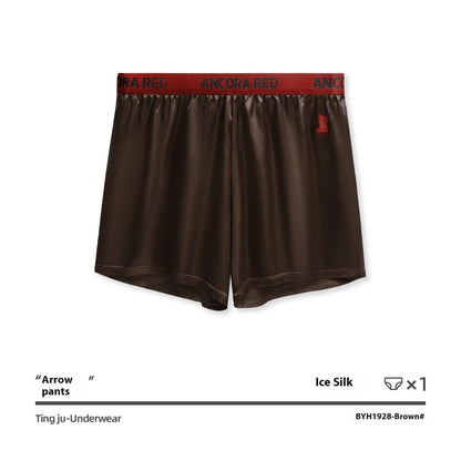 Men's solid black knitted polyester boxer briefs with a mid-waist band, laid flat on a grey background.