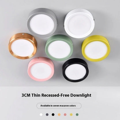 Ultra-thin 1.5cm LED surface mounted downlight in black shell with adjustable colour temperature lighting