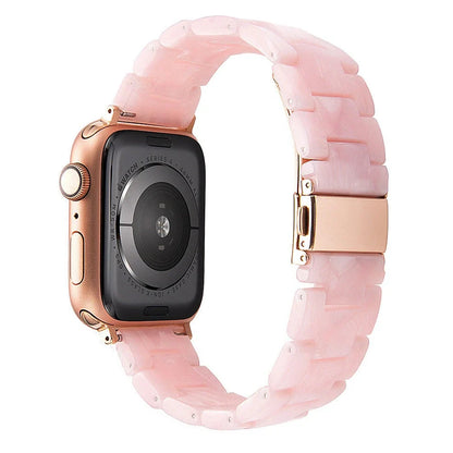 Slim resin Apple Watch strap showing attachment mechanism and colour options