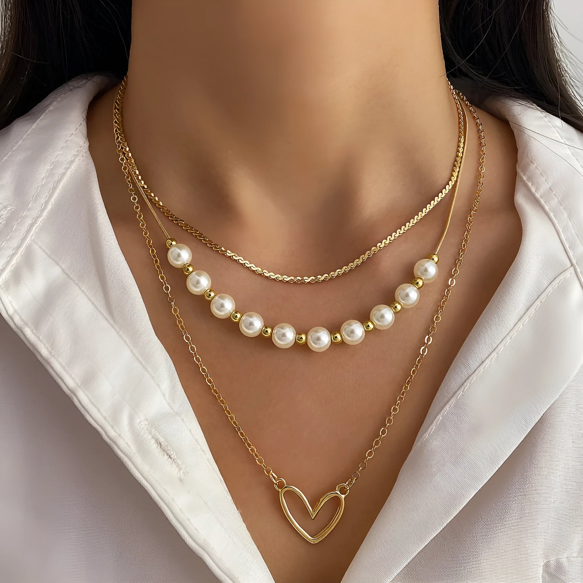 Vintage gold heart pendant necklace on a textured pearl chain, adjustable 41-50cm length.