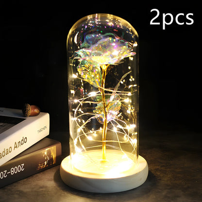 Little Prince rose arrangement under 20x9cm glass dome with gold foil flowers