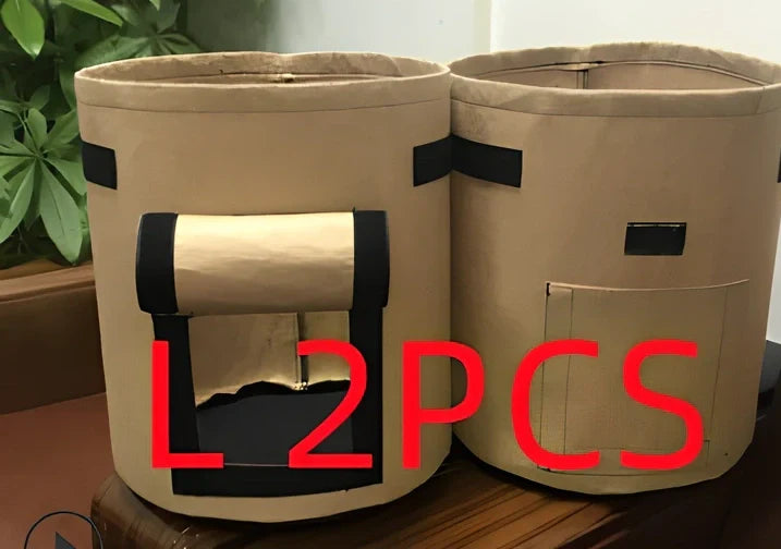 Black plant growth bag with side harvesting window and double handles for potato gardening