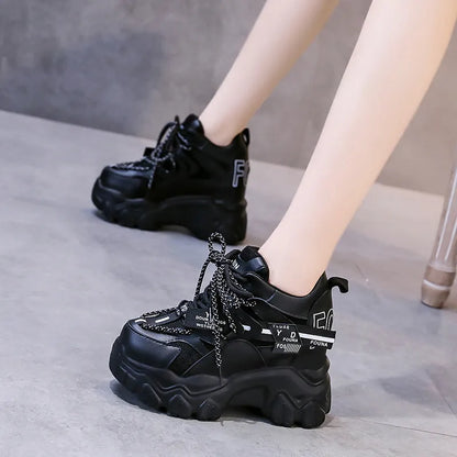 Women's white breathable mesh platform sports shoes with cross-strap detail and rubber sole