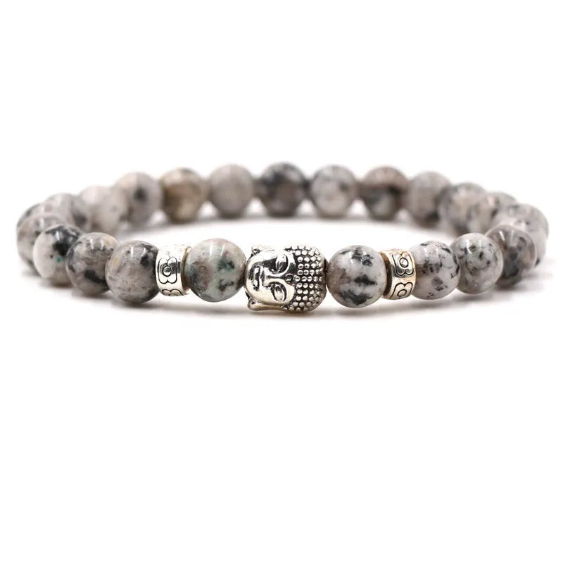 Natural stone stretch bracelet with round beads in various colours including Tigereye and turquoise.