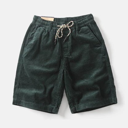 Men's khaki cargo shorts with multiple pockets on a straight-leg fit, shown on a hanger.