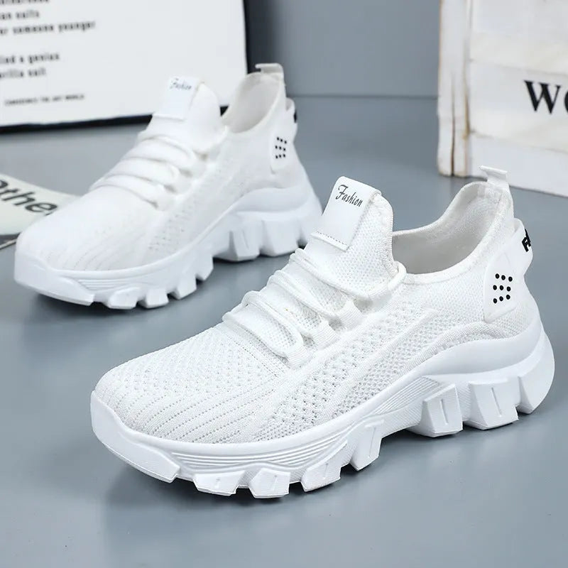 Women's sneakers with thick injection-moulded PVC sole for running and casual wear, flyknit upper for breathability, lace-up design in beige, black, pink or white, available in sizes 36 to 41.