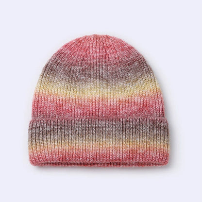 Gradient yarn knitted hat with tapered top in light blue colour showing knitted texture