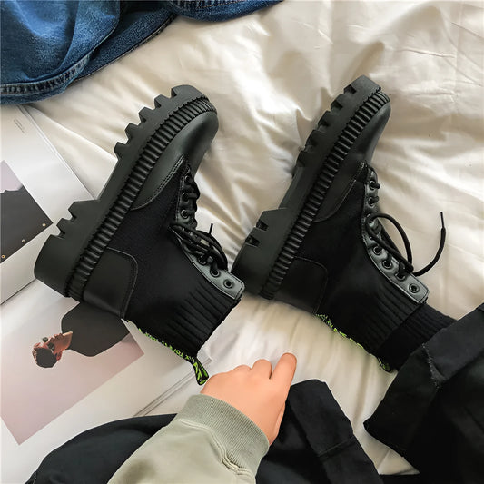 Men's black platform Doc Martens boots with zipper, high top 8-hole design, and frosted cowhide leather