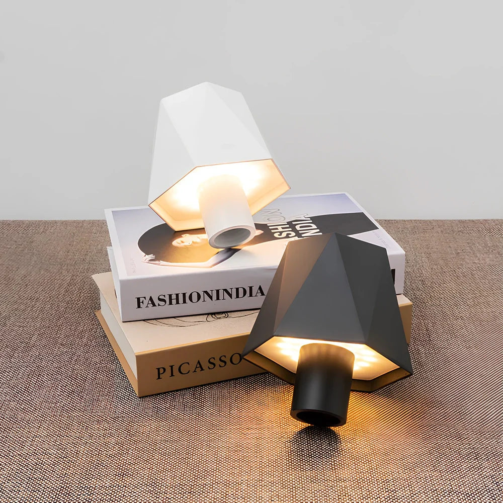 Wireless wine bottle lamp with USB charging cable in black aluminium finish showing LED illumination