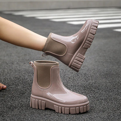PVC low tube rain boots in apricot colour with non-slip sole and flat heel design