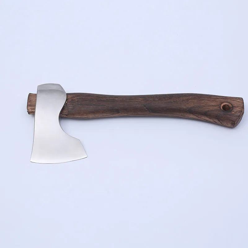 Camping axe with wooden handle and high carbon steel head on a log, showing its 250mm length.
