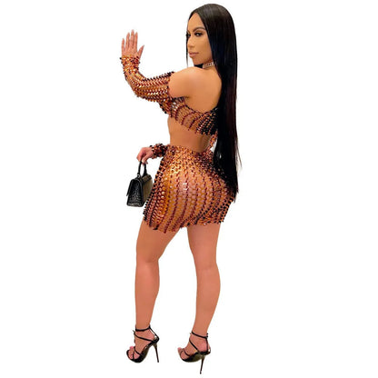 Women's black hollow-out net sleeveless top and short skirt two-piece set.