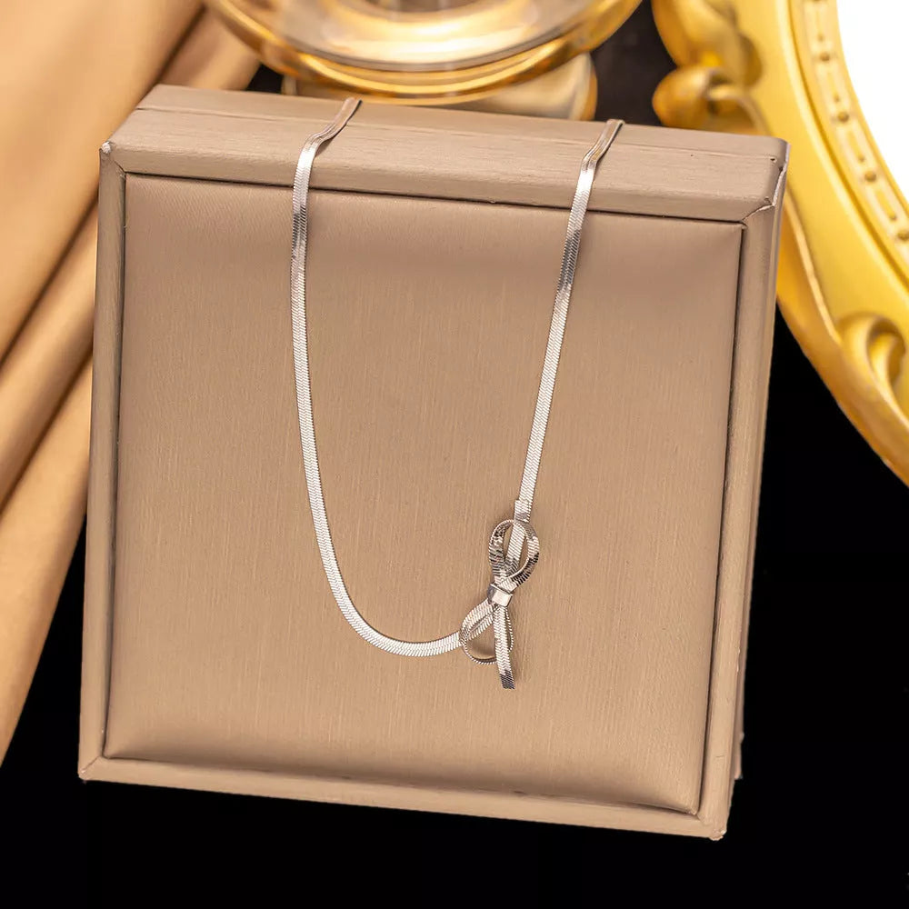 Trendy bowknot stainless steel gold plated snake chain necklace for women