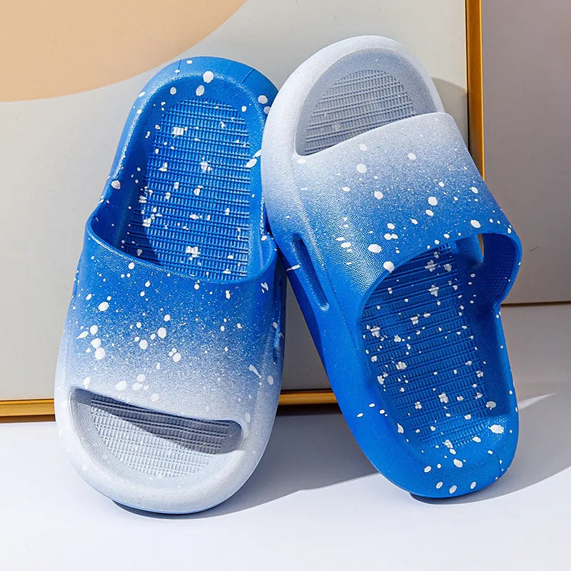 Gradient blue PVC slipper for children on a white background, showing non-slip sole.