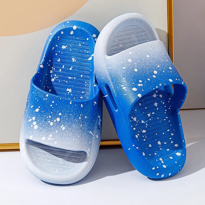 Gradient blue PVC slipper for children on a white background, showing non-slip sole.