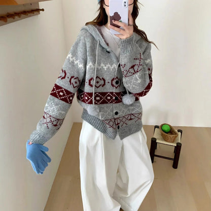 Women's loose-fit brocade sweater coat with geometric pattern in milky white colour, showing long sleeves and regular sleeve cut