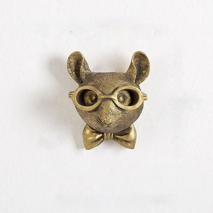 Antique bronze animal pendant showing bear design with synthetic resin construction