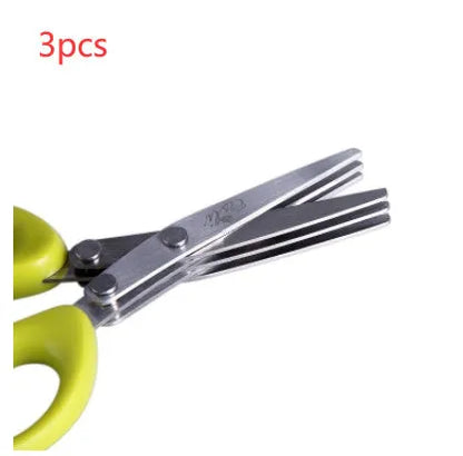 Green stainless steel multi-layer V-shaped kitchen scissors for cutting onions and herbs.