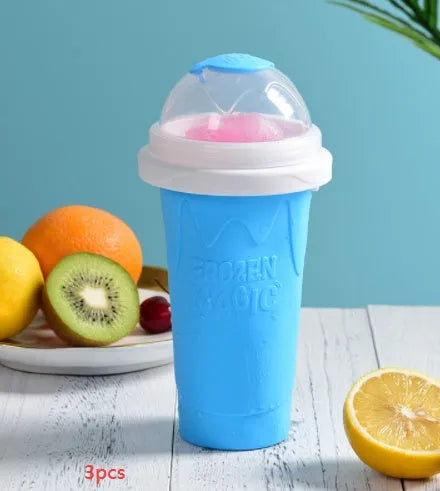 Silicone quick-freeze slush maker cup in mint green with lid and straw spoon