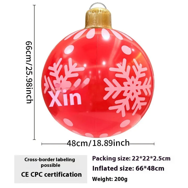 63cm red snowflake inflatable Christmas ball with flashing LED lights hanging in garden