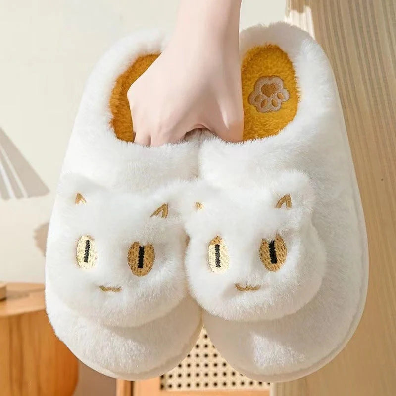 Cozy cat-themed plush slippers with soft, plush fabric and memory foam insoles for comfortable all-day wear