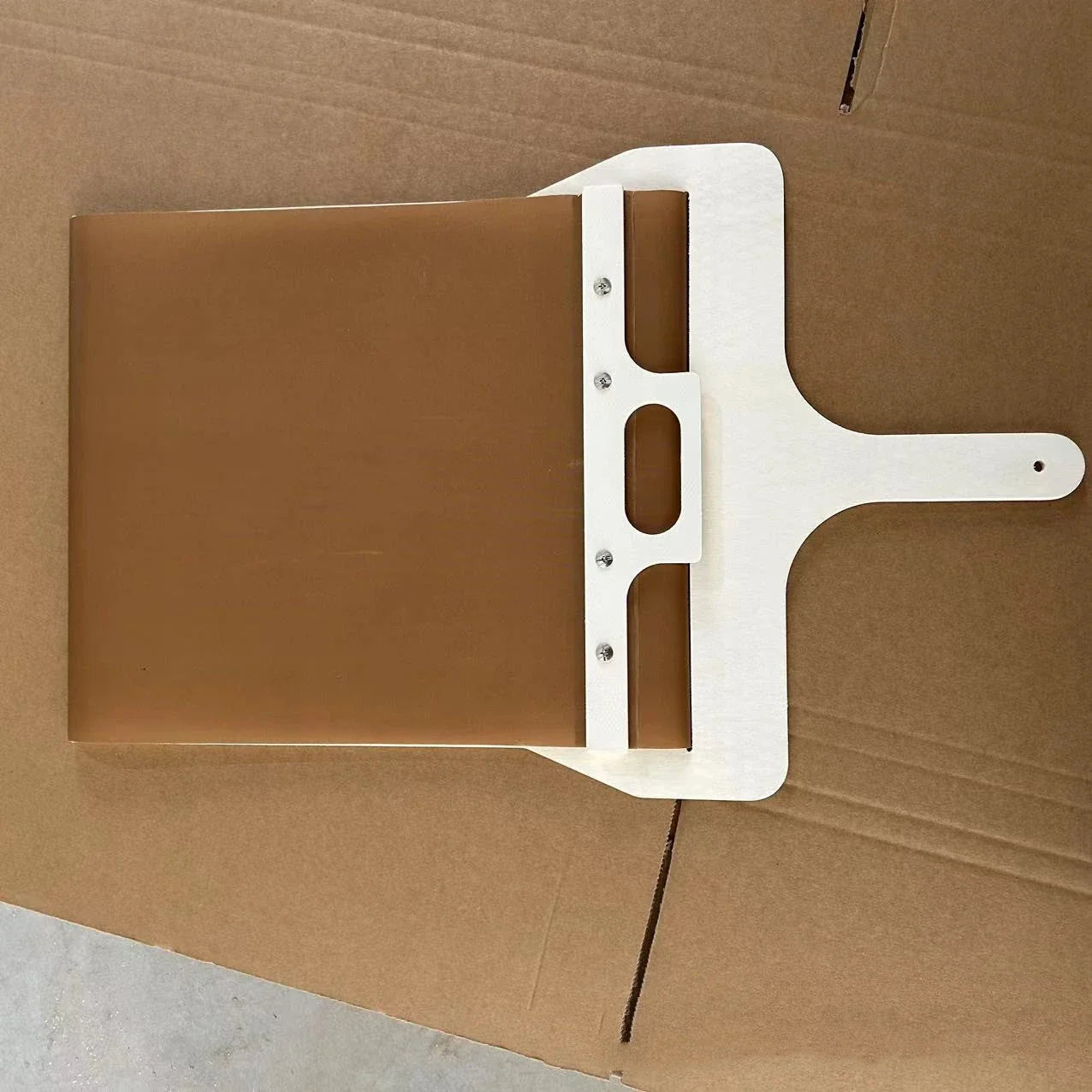 Premium natural wood pizza peel with large surface area for easy transfer of pizzas, cakes, and breads from oven to table