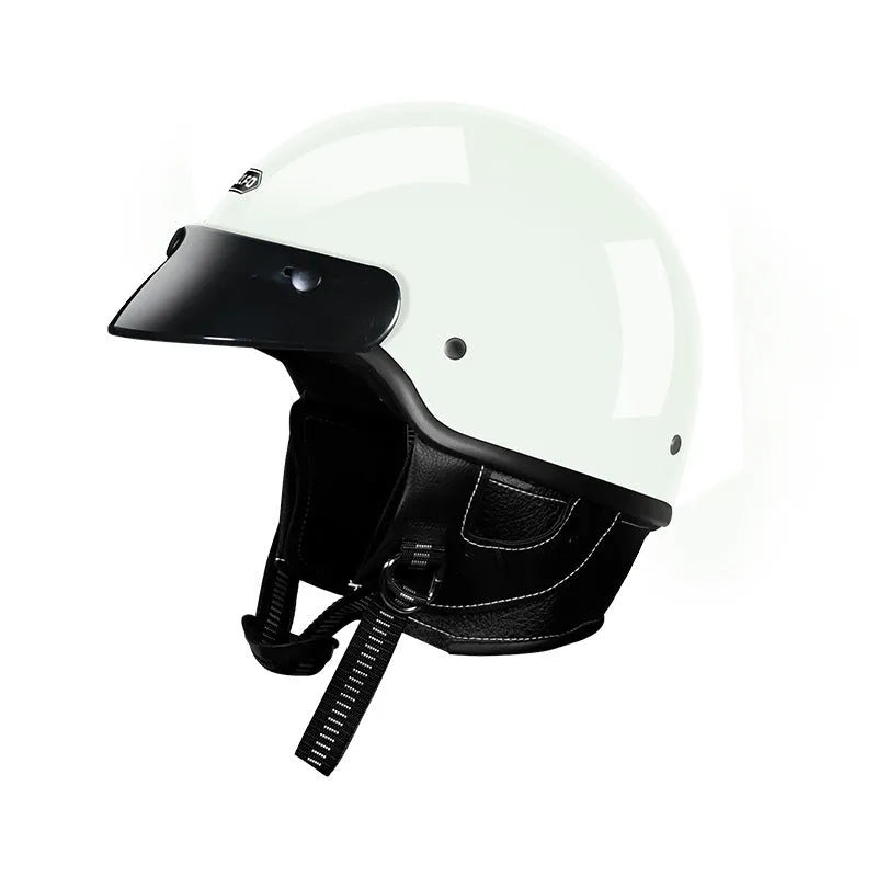 Retro full-face motorcycle helmet on a plain background, shown in cement grey colour.