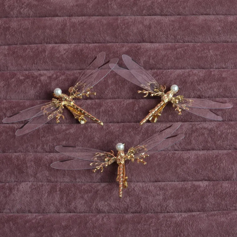 Golden dragonfly side clip headdress with detailed insect design and electroplated alloy construction