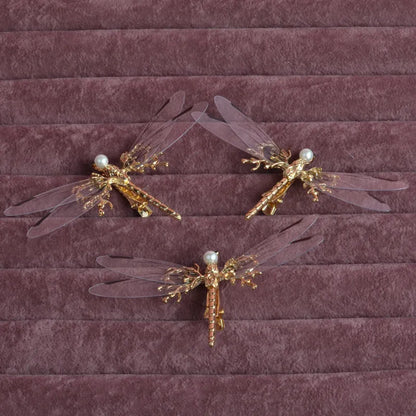 Golden dragonfly side clip headdress with detailed insect design and electroplated alloy construction