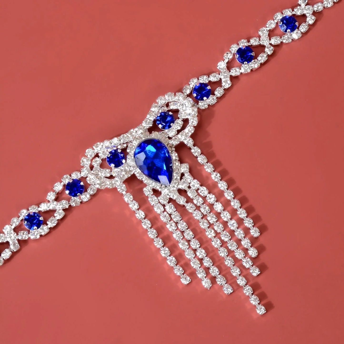 Blue rhinestone tassel anklet with gold-plated accents, perfect for women's fashion accessories.