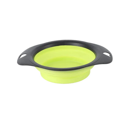 Collapsible silicone pet food bowl shown folded flat and unfolded, in green colour with non-slip base