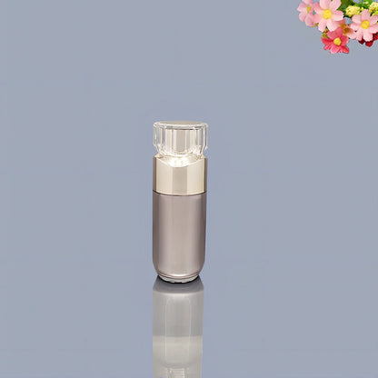 Acrylic cosmetics bottles in champagne gold and brushed white with vacuum sealing, various sizes from 5g to 120ml