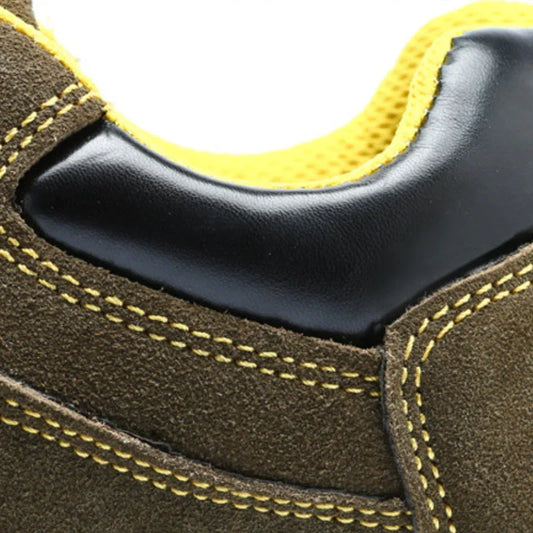 Bronze low-cut leather safety shoes with steel toe cap and patterned non-slip rubber sole.