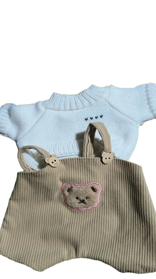 30cm doll clothing collection showing multiple outfit pieces including hooded jackets, sweaters, and suspender pants