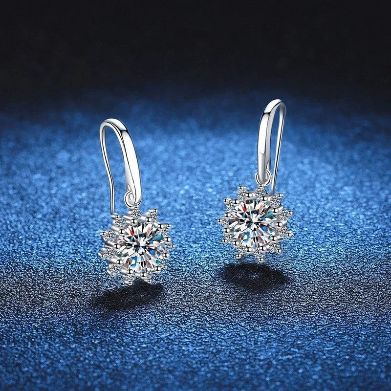 Elegant sunflower-inspired ear cuffs with a gleaming white gold finish, offering affordable luxury and sophisticated style.
