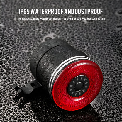 Black aluminium alloy bicycle taillight measuring 35x39x58mm with USB charging port and brake sensing technology