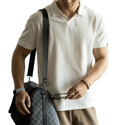 Light blue cotton polyester short-sleeved polo shirt on a hanger.