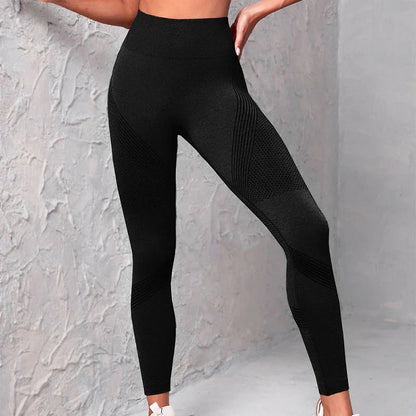 Women's high-waist seamless leggings in a variety of vibrant colors, featuring a curve-flattering design and breathable nylon fabric