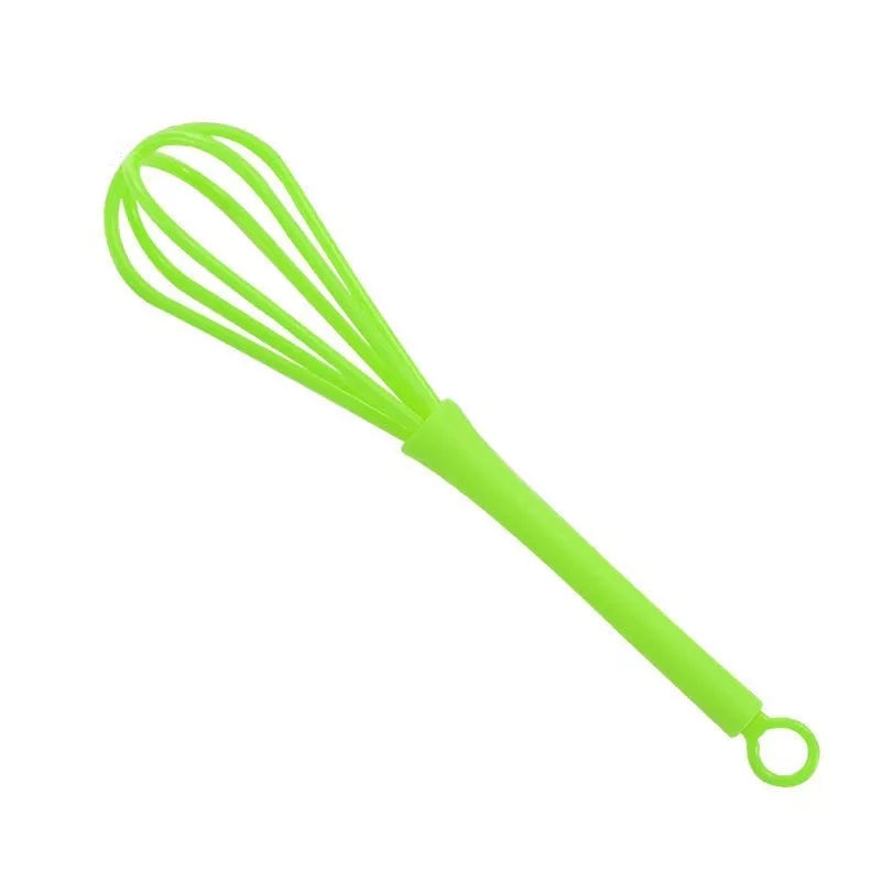 Mini manual eggbeater in green or yellow for efficient baking