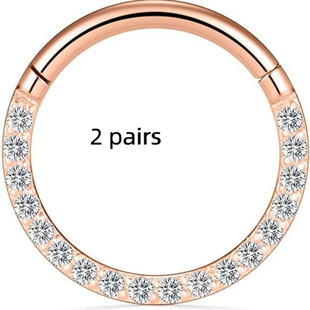 Stainless steel nose ring with diamond accent in seamless round design, showing size options and colour variations