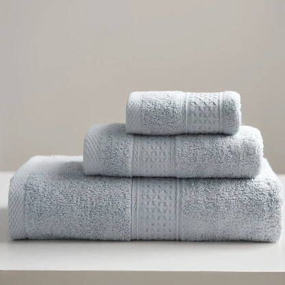 Three cotton towels: 33cm square, 32cm×73cm standard, 70cm×140cm bath towel in coordinated colours
