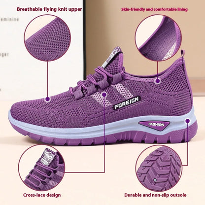 Low-top casual shoes with mesh upper and flat PVC sole in black, grey, purple, or red.