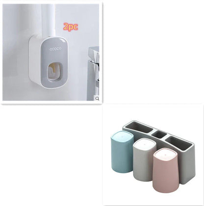 Wall-mounted automatic toothpaste dispenser with toothbrush holder and storage organizer, available in black and grey colors