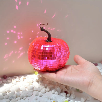 A Chinese-style embroidered glass pumpkin Halloween decoration in various sizes.