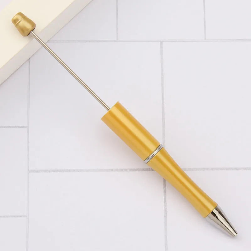 Rotating bead ballpoint pen in gradient colour with ABS plastic and steel wire construction